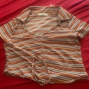 A crop top shirt and it's adjustable